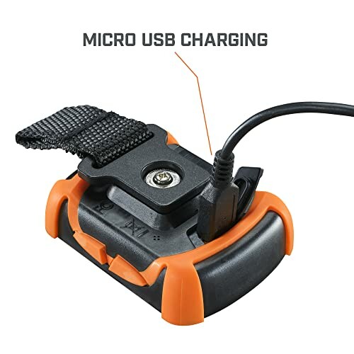 Device with micro USB charging port and strap.